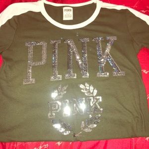 Short sleeve shirt with sparkle writing.